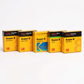 Five Kodak Super 8 film boxes on a white background